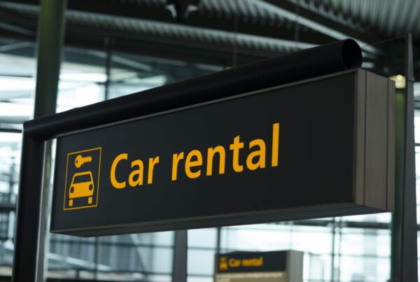 Sign with direction to car rental