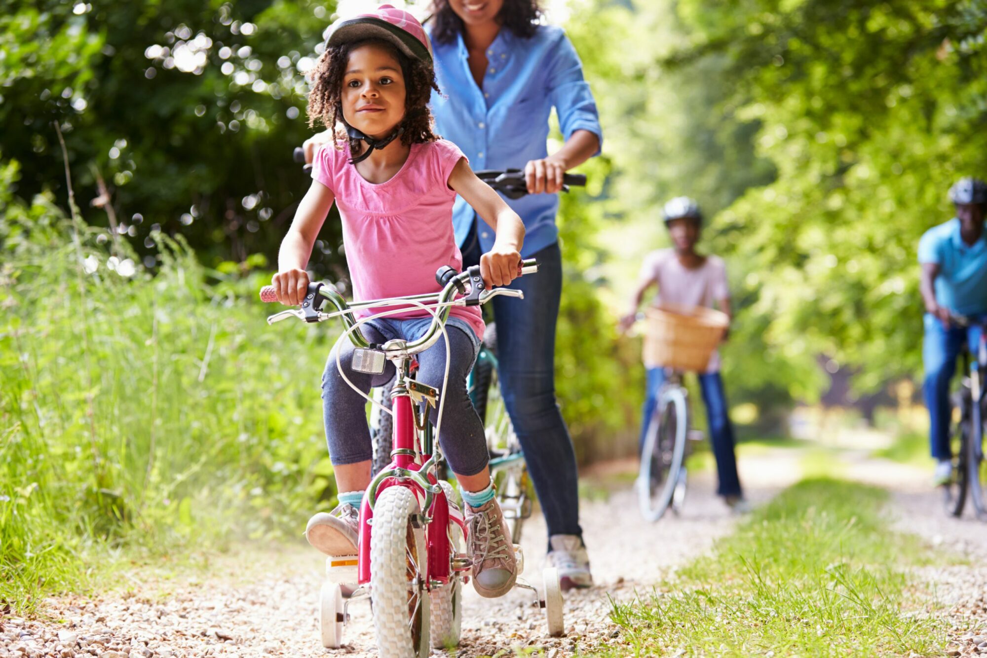 Family summer safety Cycle Ride with helmets
