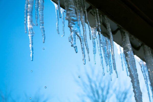 Beautiful,Icicles,Shine,In,Sun,Against,Blue,Sky.,Spring,Landscape