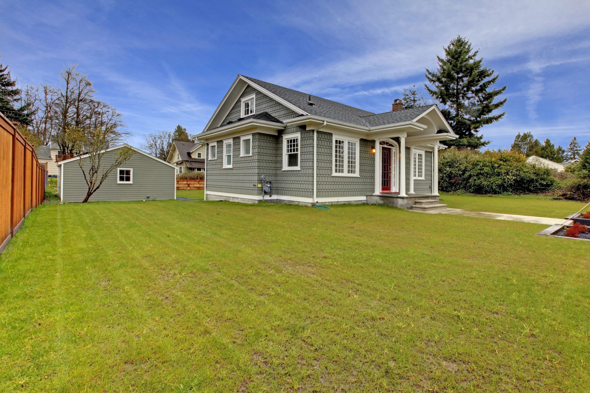 home with matching detached garage.