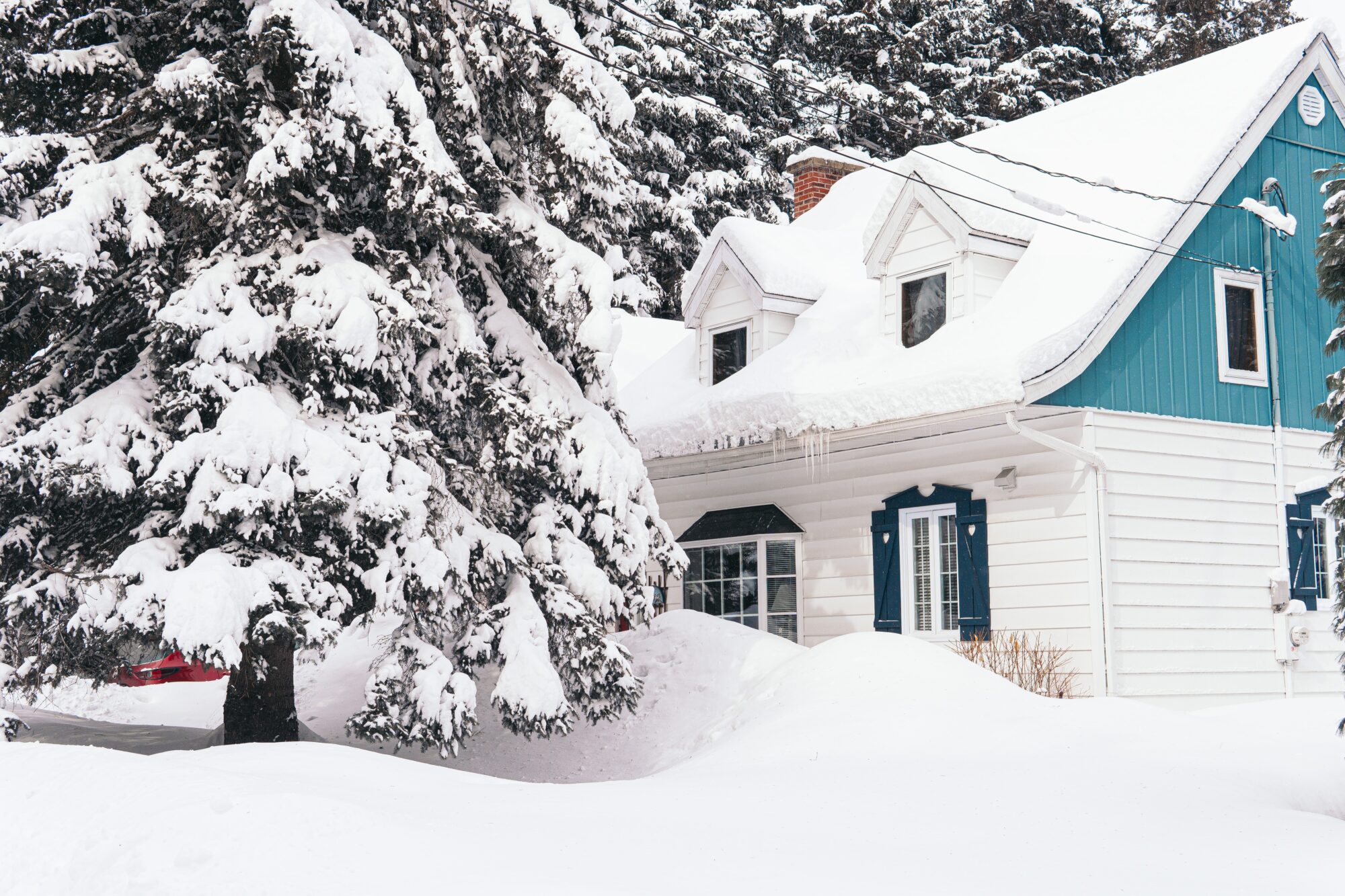 Snow-covered winter home has been well protected and insured