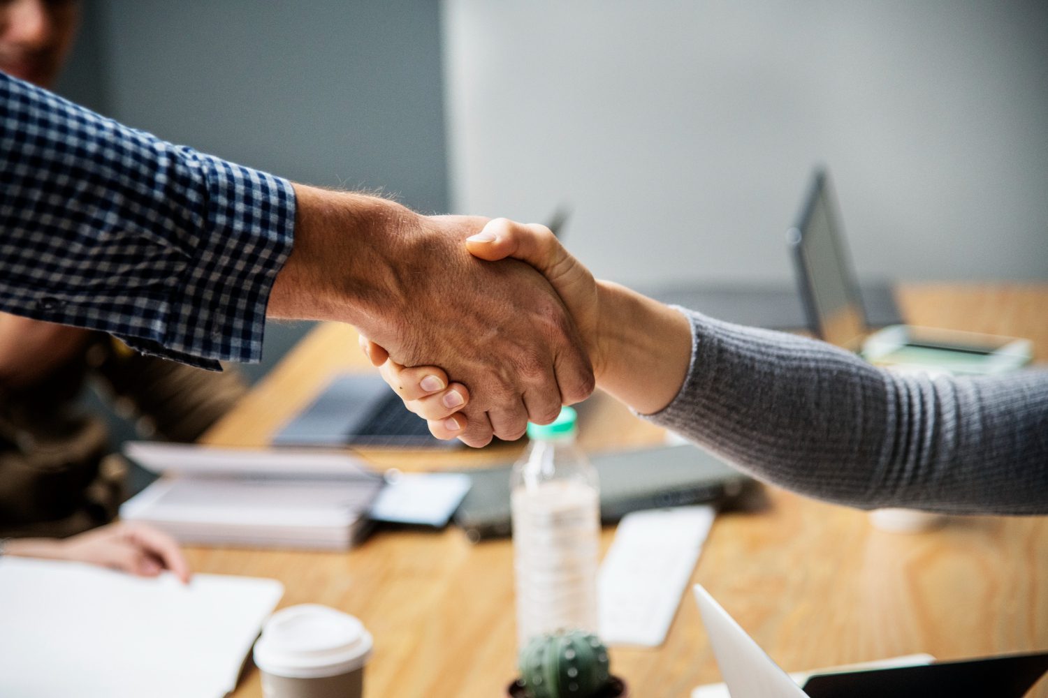 Two people shaking hands