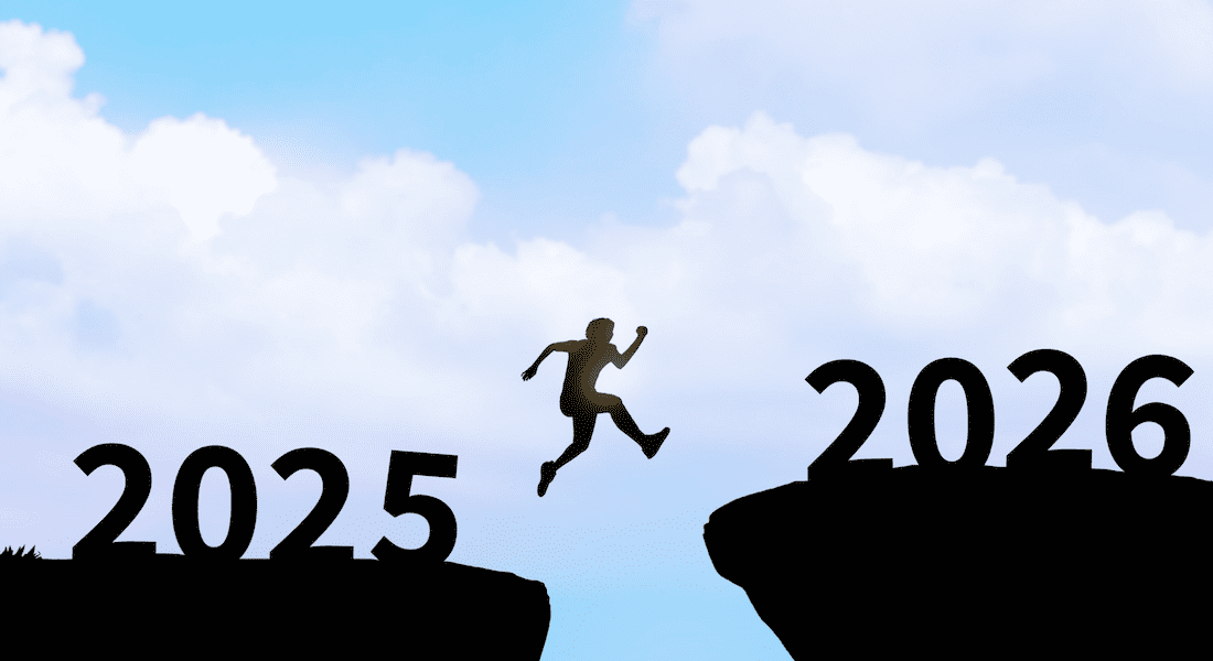 Silhouette of a person leaping across a gap from “2025” to “2026,” symbolizing transition into the new year and moving forward with confidence against a blue sky background.