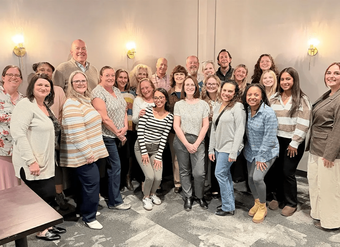 YMI, Robertson Insurance Group, and Carl’s Insurance Agency teams gathered together at Edge Restaurant celebrating their joining.